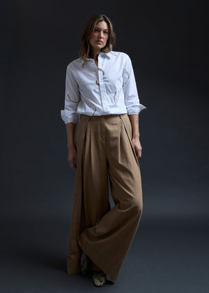 White Eyes Embroidery Gathered Hem Shirt