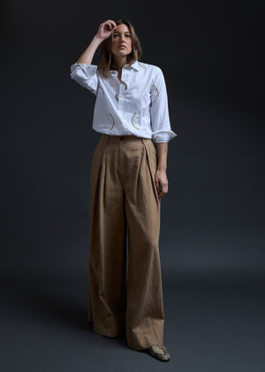 White Eyes Embroidery Gathered Hem Shirt