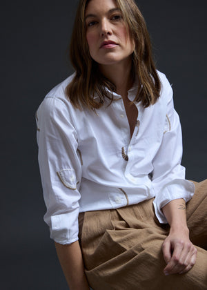 White Eyes Embroidery Gathered Hem Shirt